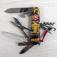 Складаний ніж Victorinox HUNTSMAN ZODIAC Дерев'яна змія 1.3713.3.Z4280pk - картинка, зображення, фото ножа