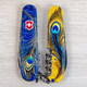 Складной нож Victorinox SPARTAN UKRAINE Волшебное перо Жар-Птицы 1.3603.3.T3150pw фото