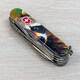 Складаний ніж Victorinox DELUXE TINKER ANIMAL Єнот 1.4723.3.F1120pw - картинка, зображення, фото ножа
