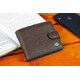 Шкіряне чоловіче портмоне на кнопці ST Leather ST104 Чорний картинка, зображення, фото
