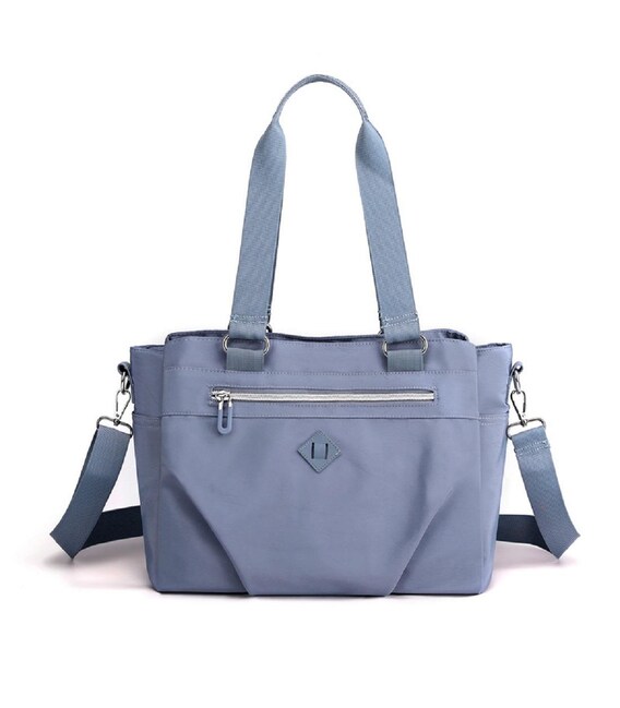 Жіноча текстальна містка сумка Confident WT-8533LB картинка, зображення, фото