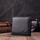 Кошелек среднего размера с оригинальной монетницей из натуральной кожи ST Leather 22458 Черный фото