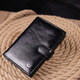 Вертикальный мужской бумажник из натуральной кожи ST Leather 19406 Черный фото