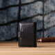 Компактный мужской бумажник вертикального формата из натуральной кожи ST Leather 23095 Черный фото