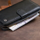Вертикальный вместительный кошелек из кожи унисекс ST Leather 19300 Черный фото