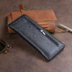 Горизонтальный тонкий кошелек из кожи унисекс ST Leather 19324 Черный фото