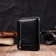 Женский кожаный кошелек на молнии с металлическим логотипом производителя ST Leather 19483 Черный фото
