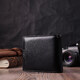 Отменный горизонтальный бумажник для мужчин из натуральной кожи ST Leather 22465 Черный фото