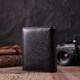 Бумажник вертикального формата из натуральной кожи ST Leather 22474 Черный фото