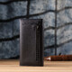 Женский вертикальный кошелек из натуральной кожи ST Leather 23084 Черный фото