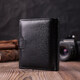 Вертикальный мужской бумажник из натуральной кожи ST Leather 22479 Черный фото