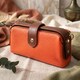 Яркий клатч с интересной защелкой из натуральной кожи Vintage 22424 Оранжевый фото