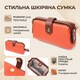 Яркий клатч с интересной защелкой из натуральной кожи Vintage 22424 Оранжевый фото